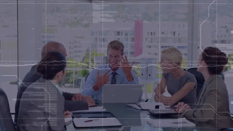 Diverse Business Team Engages in Financial Analysis Meeting