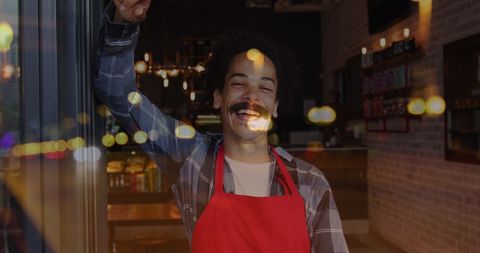 Smiling Cafe Worker with Overlay of Light Spots