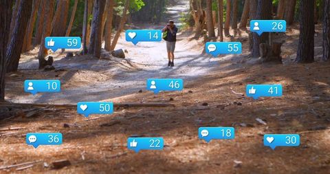 Senior Male Hiker Exploring Forest Trail with Digital Icons