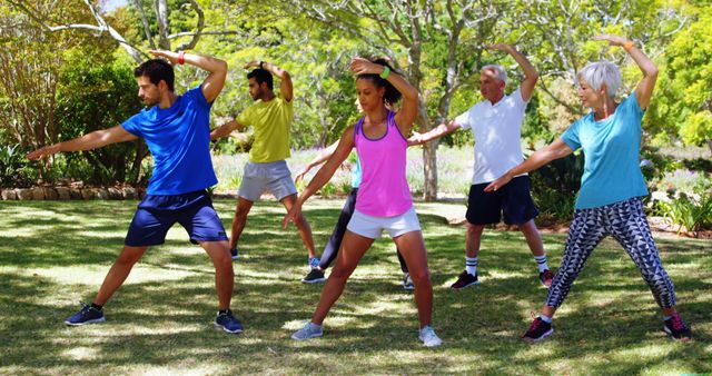 Diverse Group Exercising Outdoors in Park Setting - Download Free Stock Images Pikwizard.com