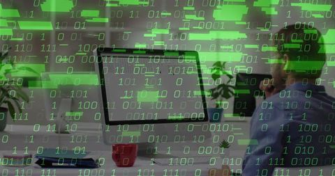 Software developer with binary code overlay on computer screen