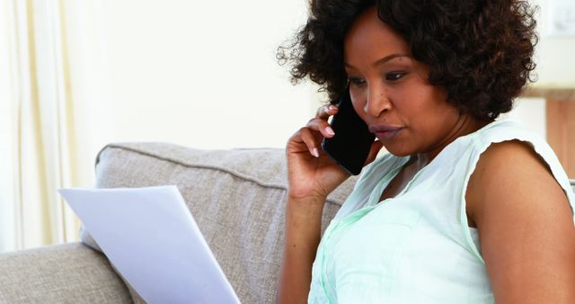 Professional African-American Woman Handling Business Over Phone - Download Free Stock Images Pikwizard.com