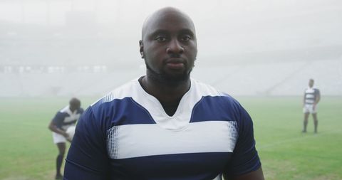 Confident Rugby Player in Stadium Fog
