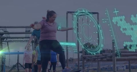 Diverse women conquering obstacle course with digital interface overlay