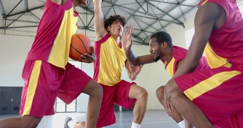 Dynamic basketball team strategy session indoor court