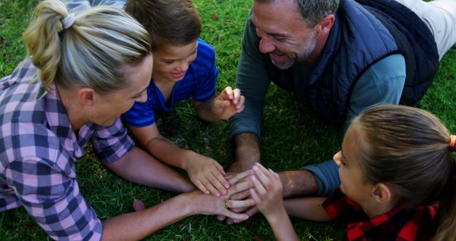 Joyful Family Bonding Time Outdoors on Lawn - Download Free Stock Images Pikwizard.com