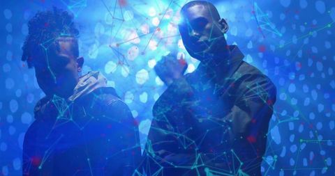 Dynamic Portrait of Men in Futuristic Blue Glow with Digital Network