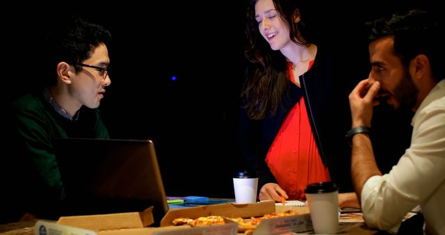 Group of Colleagues Working on Project Late at Night in Office - Download Free Stock Images Pikwizard.com