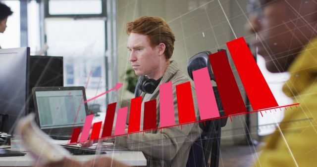 Young Businessman Analyzing Positive Growth Charts in Office - Download Free Stock Photos Pikwizard.com