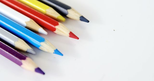 Close-Up of Multicolored Pencils on White Surface - Download Free Stock Images Pikwizard.com