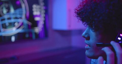 Focused Young Professional Analyzing Digital Data on Screen