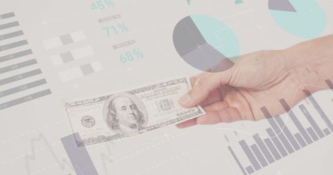 Hand Holding US Dollar Bill with Financial Graph Overlays - Download Free Stock Images Pikwizard.com