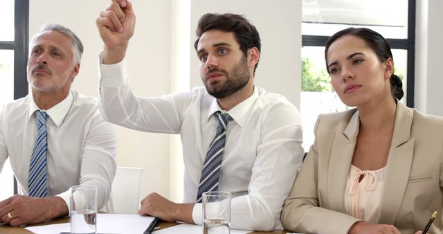 Business Team Engaging in Corporate Meeting Discussion - Download Free Stock Images Pikwizard.com