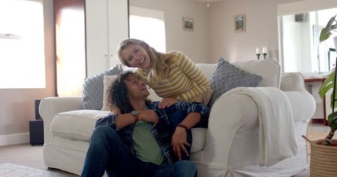 Cheerful Embracing Couple Relaxing Together at Home - Download Free Stock Images Pikwizard.com