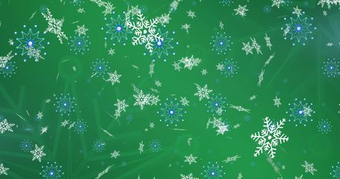 snowflakes of various sizes floating against bright green backdrop, perfect for holiday themes. use for festive greetings, christmas cards, winter promotions, and digital designs to evoke seasonal joy and traditional celebration vibes.