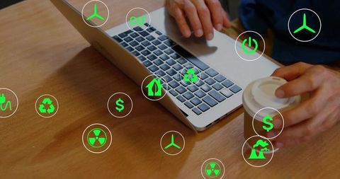 Hands typing on laptop while holding coffee with green sustainability icons overlay