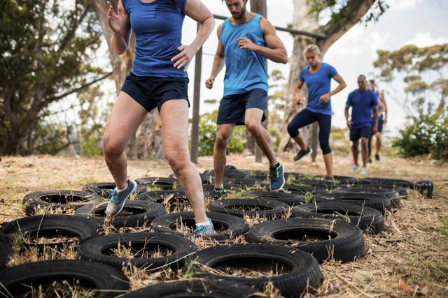 Group Training on Tire Obstacle Course in Boot Camp - Download Free Stock Photos Pikwizard.com