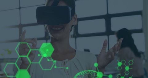 Businesswoman Engaging with Virtual Reality and Futuristic Technology - Download Free Stock Images Pikwizard.com