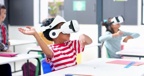 Children Engaging in Virtual Reality Learning in Classroom