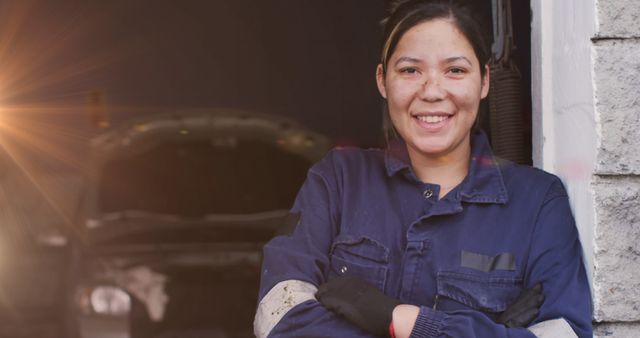 Female Auto Mechanic Smiling in Car Repair Shop - Download Free Stock Images Pikwizard.com