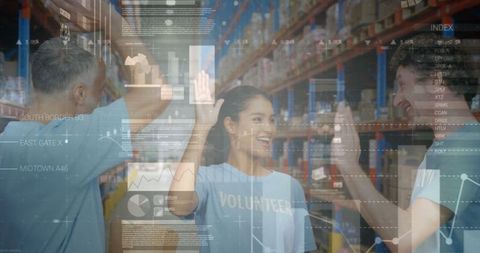 volunteers collaborating in digitalized warehouse environment - Download Free Stock Images Pikwizard.com