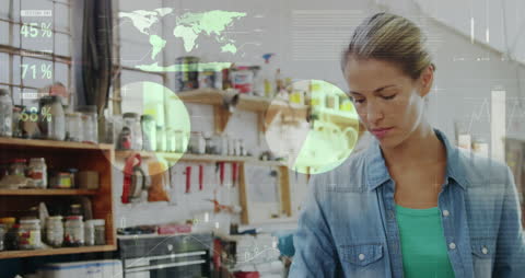 Businesswoman Analyzing Data in Workshop Setting