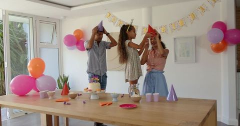 Family Preparing for Birthday Celebration at Home