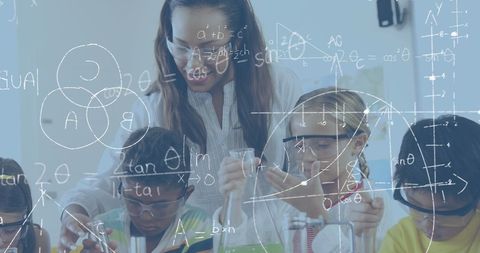 Engaged Students Exploring Chemistry with Scientifc Calculator Symbols - Download Free Stock Images Pikwizard.com