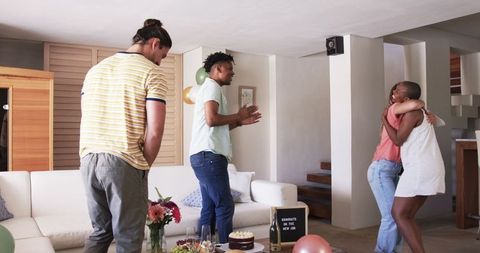 Friends celebrating new job with joy and positivity