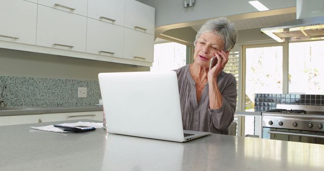 Senior Woman Managing Finances Using Laptop at Home - Download Free Stock Images Pikwizard.com