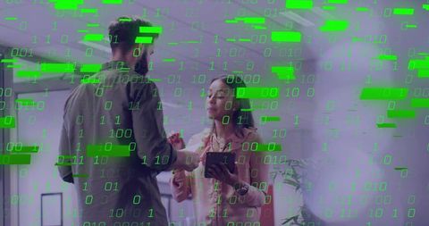 Professionals collaborating under green binary data overlay in modern office for analytics
