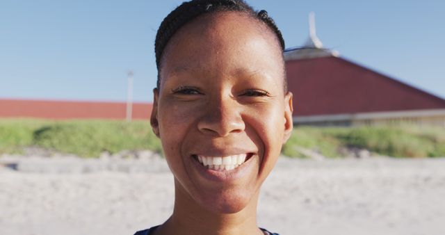 Smiling African American Woman Outdoors on Sunny Day - Download Free Stock Images Pikwizard.com