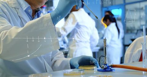 Scientists collaborating in laboratory with digital math overlay