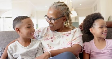 Grandmother Enjoying Time with Her Grandchildren at Home