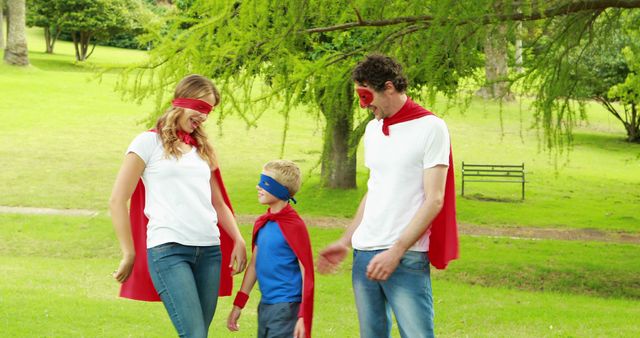 Family in Superhero Costumes Playing in Park - Download Free Stock Images Pikwizard.com