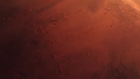 Orbiting Camera Panning Over Red Planet Surface Revealing Scattered Craters and Lit Limb