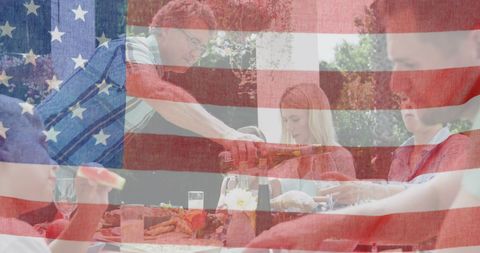 American family celebrating patriotic picnic outdoors