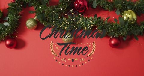 Festive garland with red and gold baubles for christmas celebration