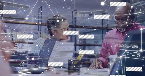 Diverse Business Team Analyzing Data with AR Technology