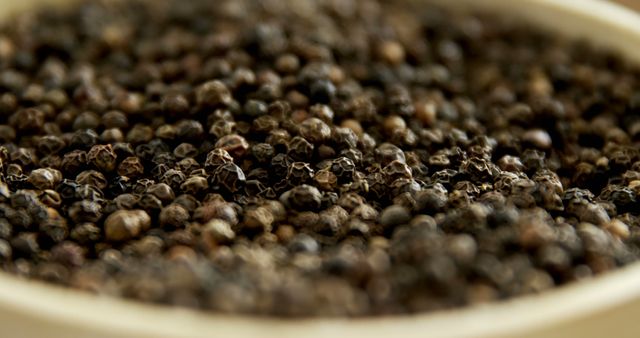 Close-up of Black Peppercorns in White Bowl - Download Free Stock Images Pikwizard.com
