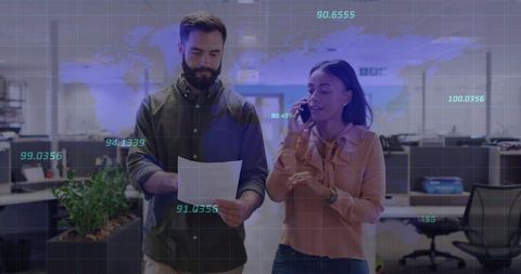 Coworkers Analyzing Document in Modern Office Hub