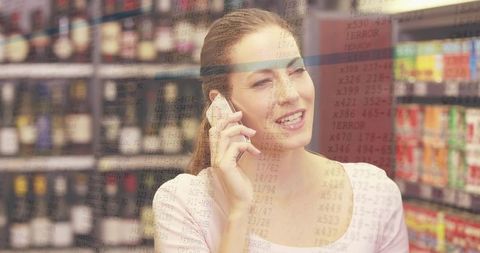 Young woman talking on mobile in supermarket aisle with error code overlay, retail tech