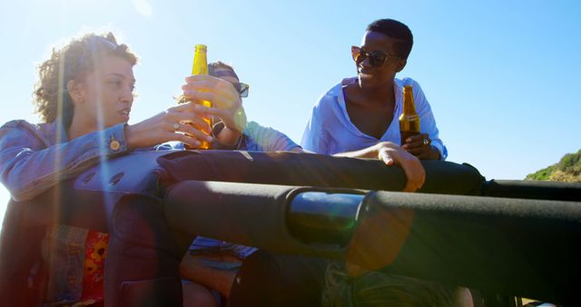 Friends Having Fun Drinking Beer on Road Trip - Download Free Stock Images Pikwizard.com