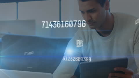 Man Analyzing Data on Laptop with Abstract Digital Overlay