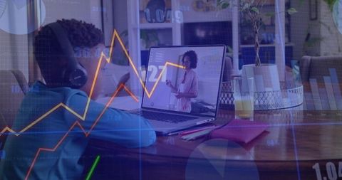 Remote learning child wearing headphones at laptop with data visualization graphs overlay