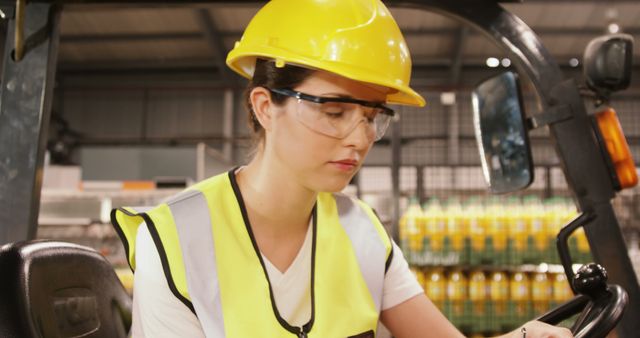 Female Factory Worker Writing and Checking on Clipboard - Download Free Stock Images Pikwizard.com