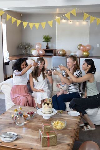 Diverse Women Celebrating Birthday with Cake and Decorations