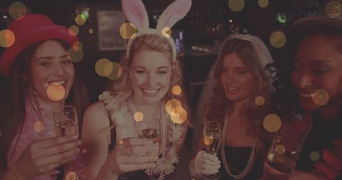 Women Celebrating Bachelorette Party Cheers with Champagne