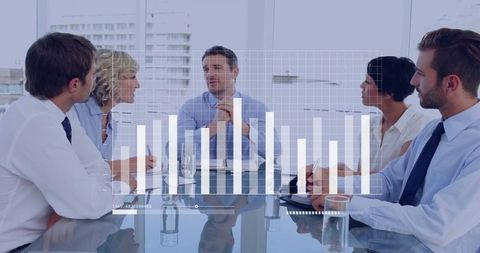 Financial Data Projection Across Team Discussing Business Strategy