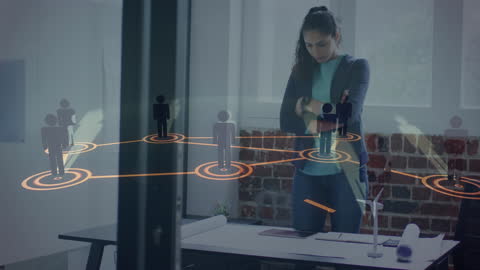 Businesswoman Analyzing Network of Virtual Connections in Modern Workspace